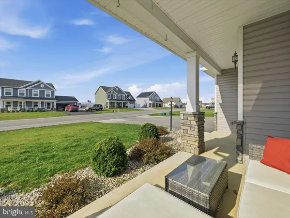 a view of front a house with a yard