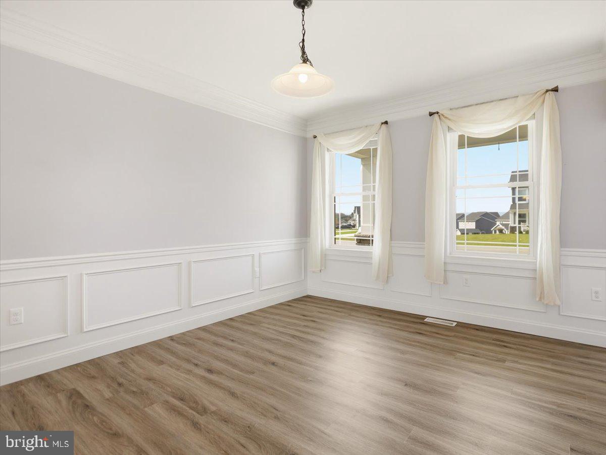 2006 Jelena Road Shippensburg, PA 17257 - Photo 8 of 47 a view of an empty room with wooden floor and a window