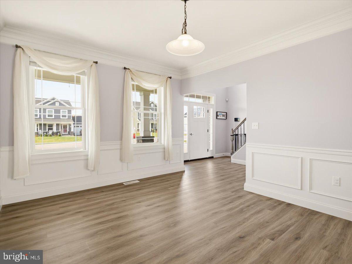 2006 Jelena Road Shippensburg, PA 17257 - Photo 9 of 47 a view of an empty room with wooden floor and a window