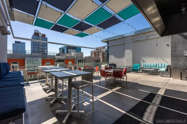 a room with lots of table and chairs