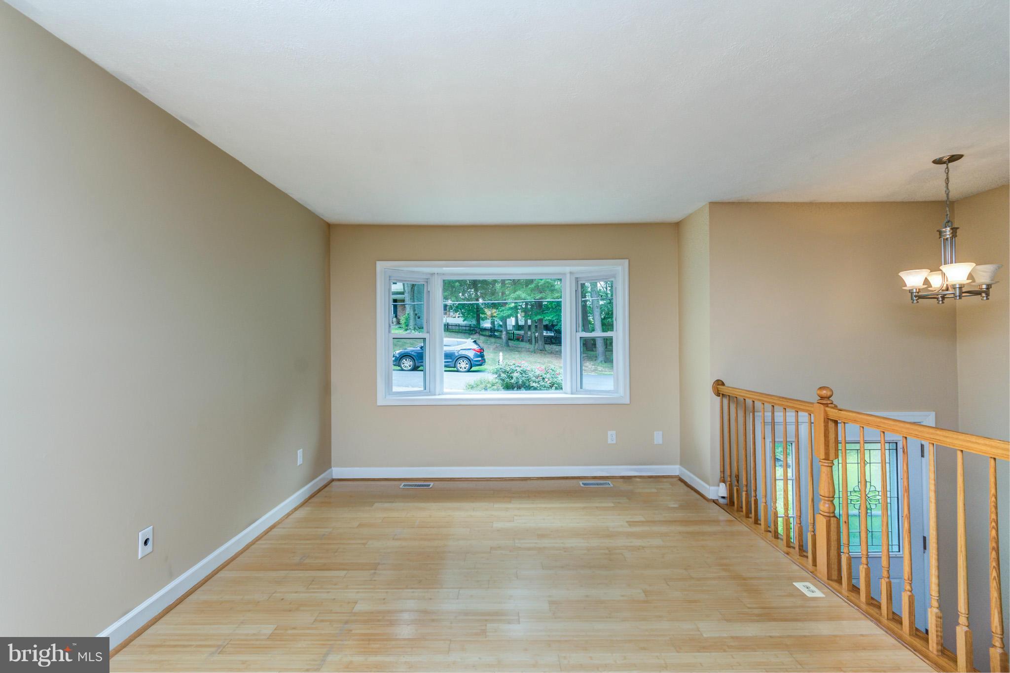 730 Rosewood Road Severn, MD 21144 - Photo 11 of 30 a view of livingroom with furniture wooden floor and window