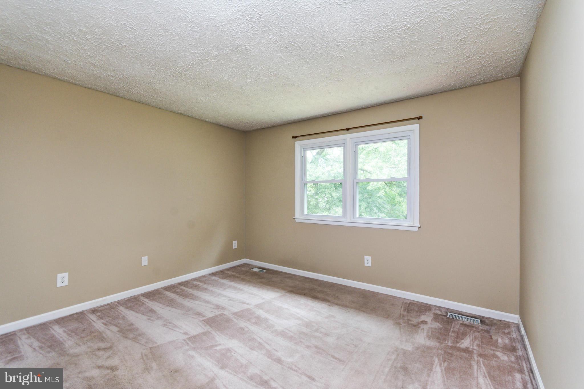 730 Rosewood Road Severn, MD 21144 - Photo 15 of 30 an empty room with a window