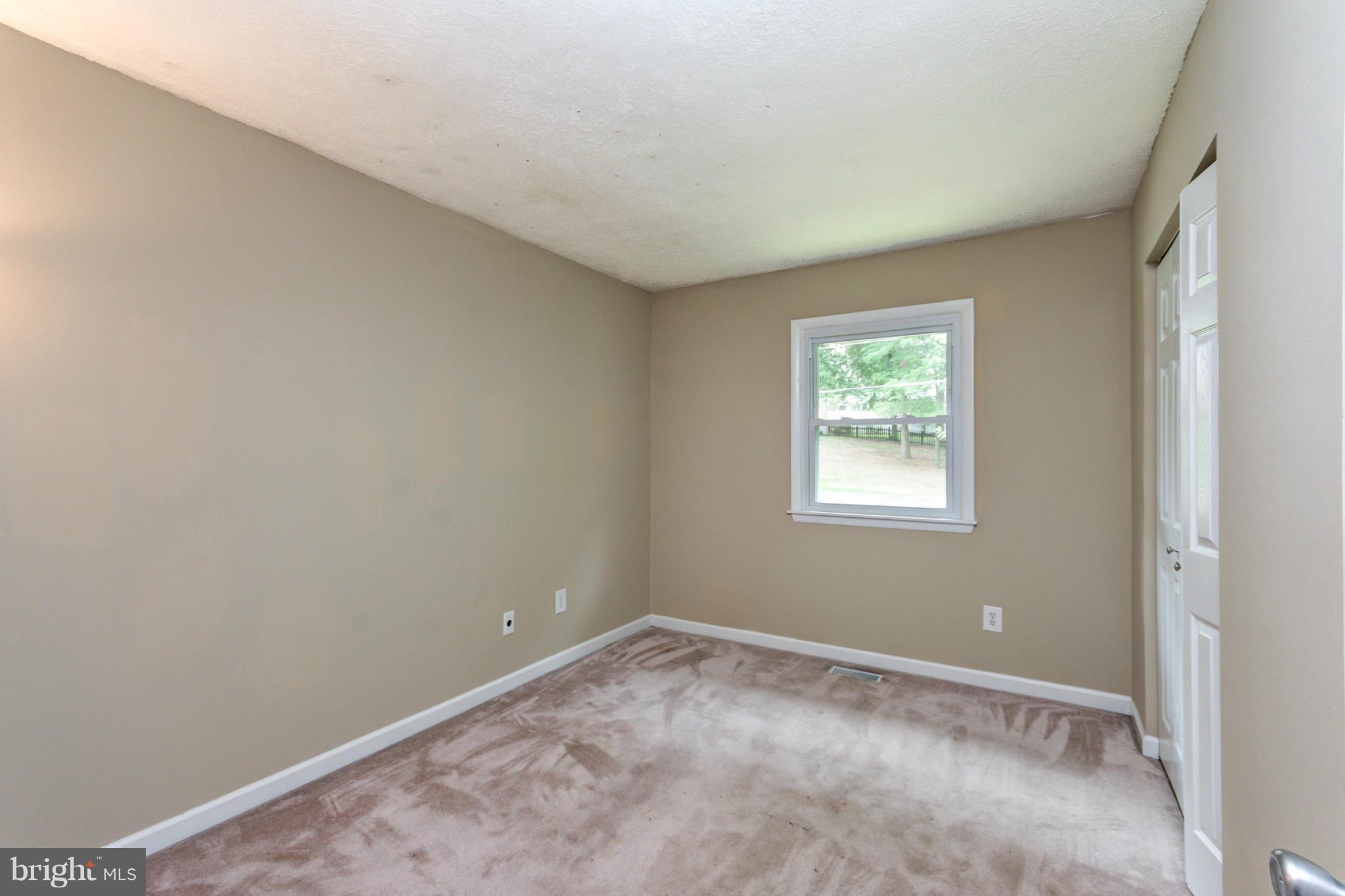 730 Rosewood Road Severn, MD 21144 - Photo 18 of 30 an empty room with a window