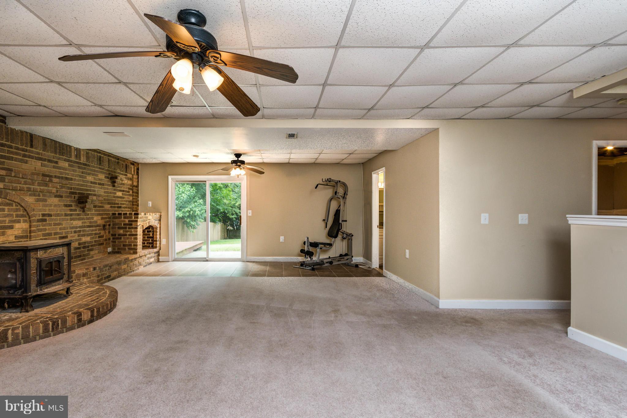 730 Rosewood Road Severn, MD 21144 - Photo 20 of 30 a view of a livingroom with furniture and a fireplace
