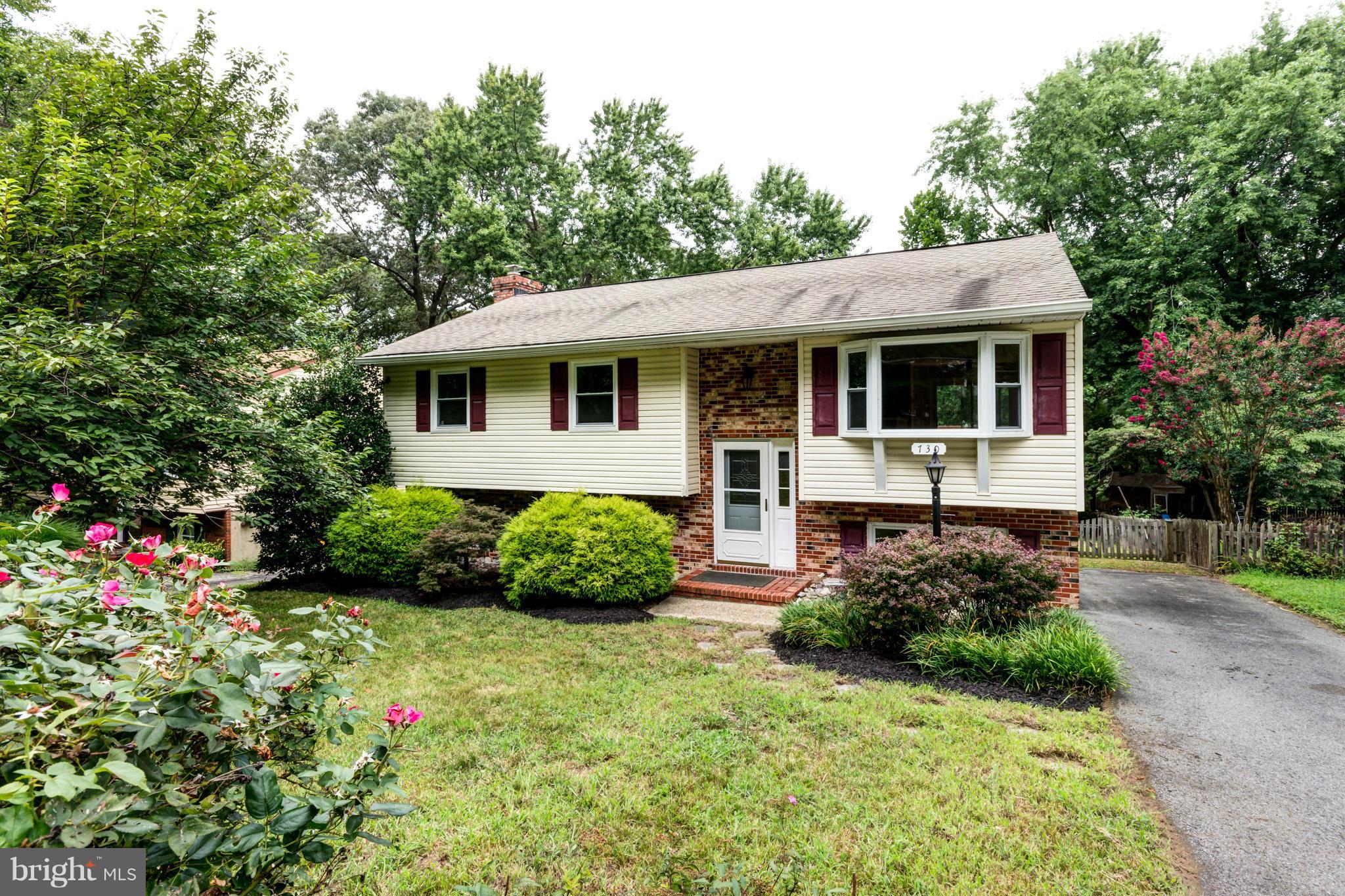 730 Rosewood Road Severn, MD 21144 - Photo 3 of 30 a front view of a house with a yard