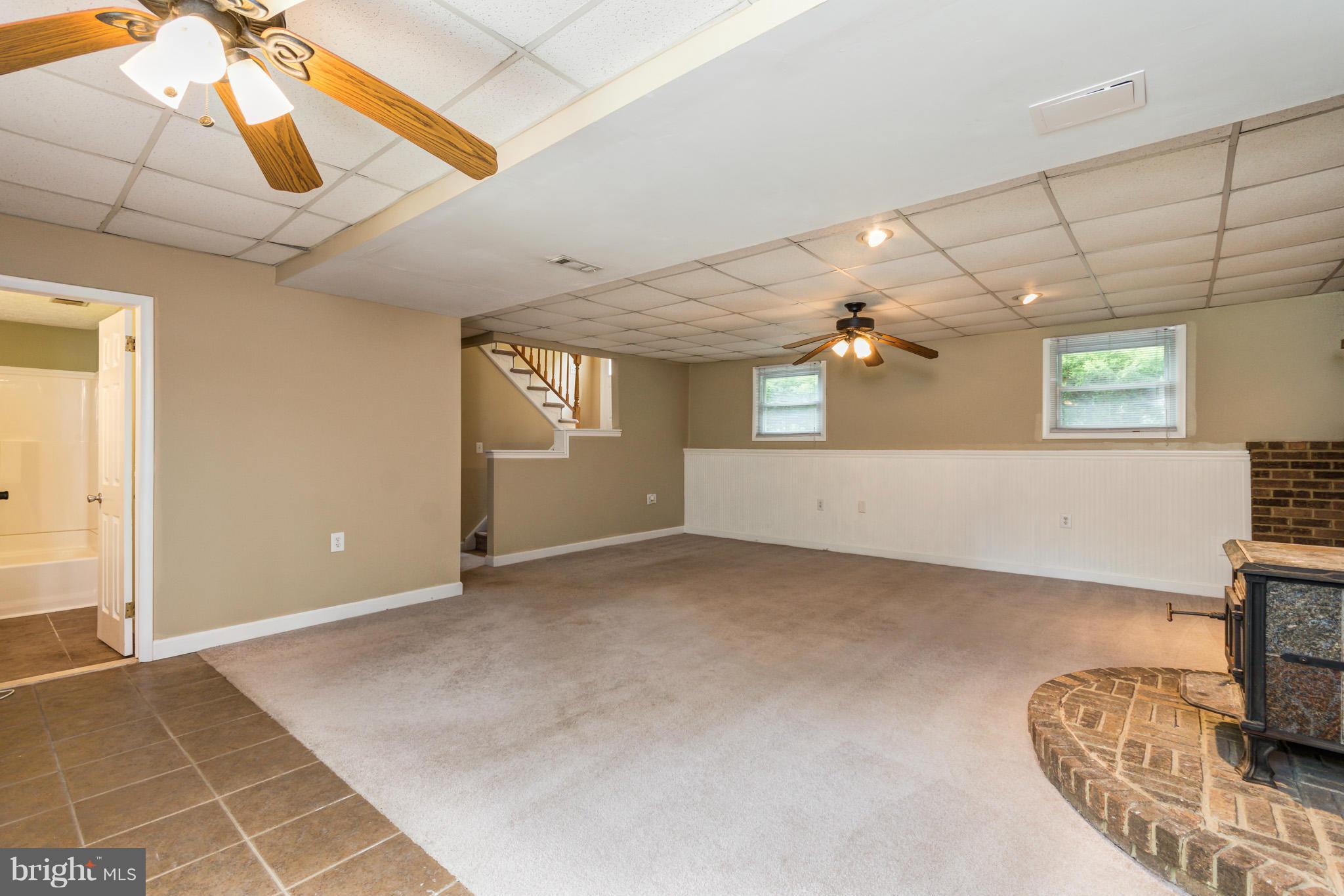 730 Rosewood Road Severn, MD 21144 - Photo 21 of 30 a view of an empty room with a window