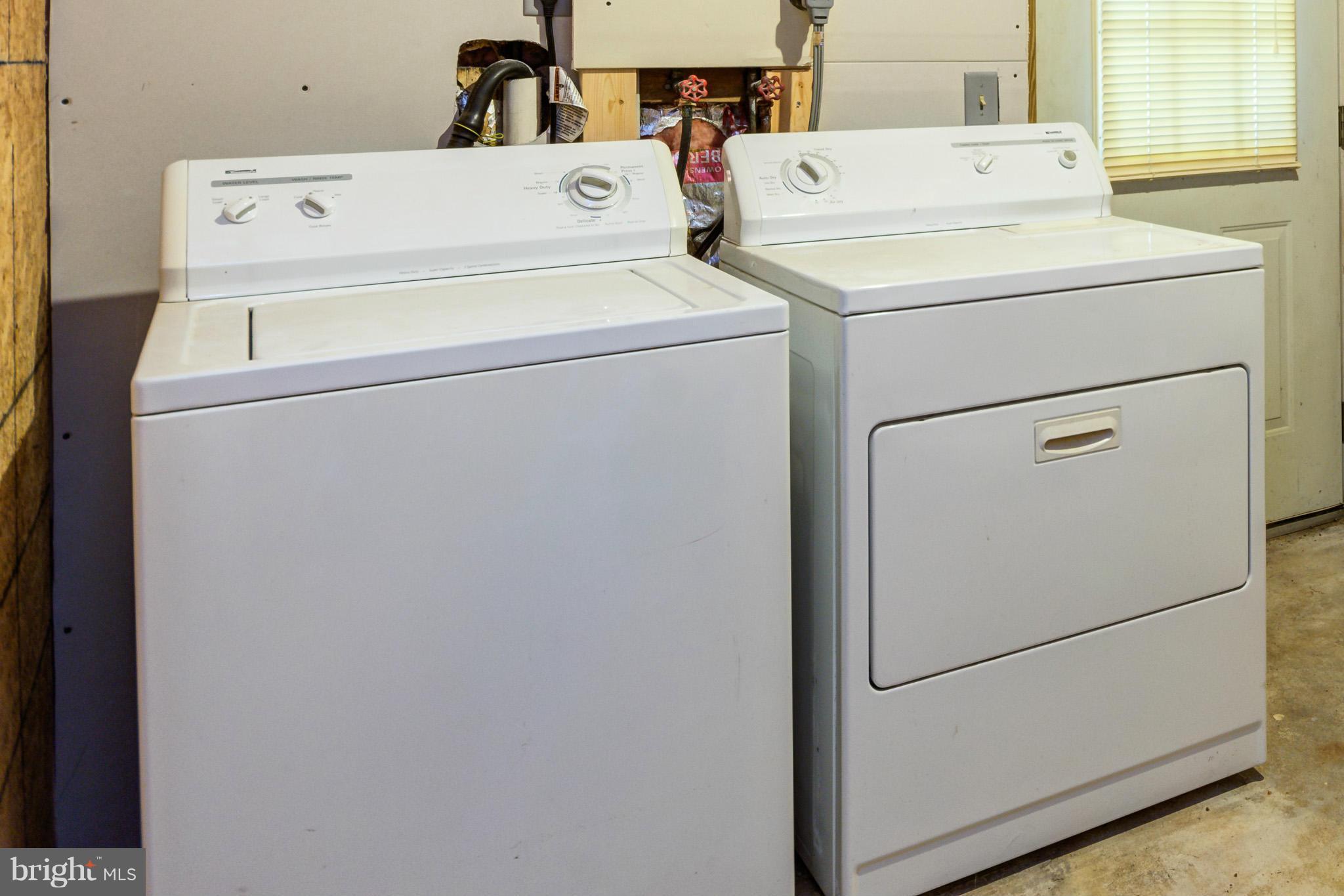730 Rosewood Road Severn, MD 21144 - Photo 25 of 30 a utility room with dryer and washer