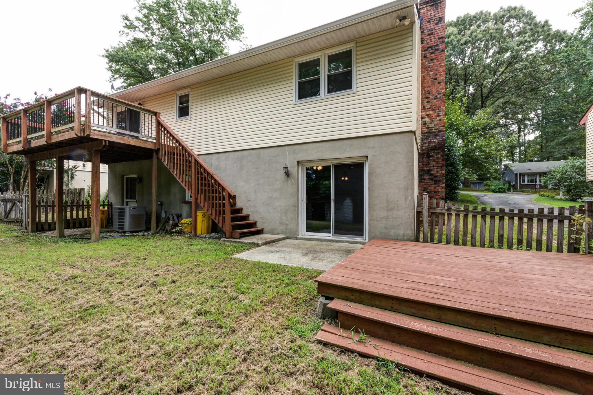 730 Rosewood Road Severn, MD 21144 - Photo 26 of 30 a view of a house with backyard and porch