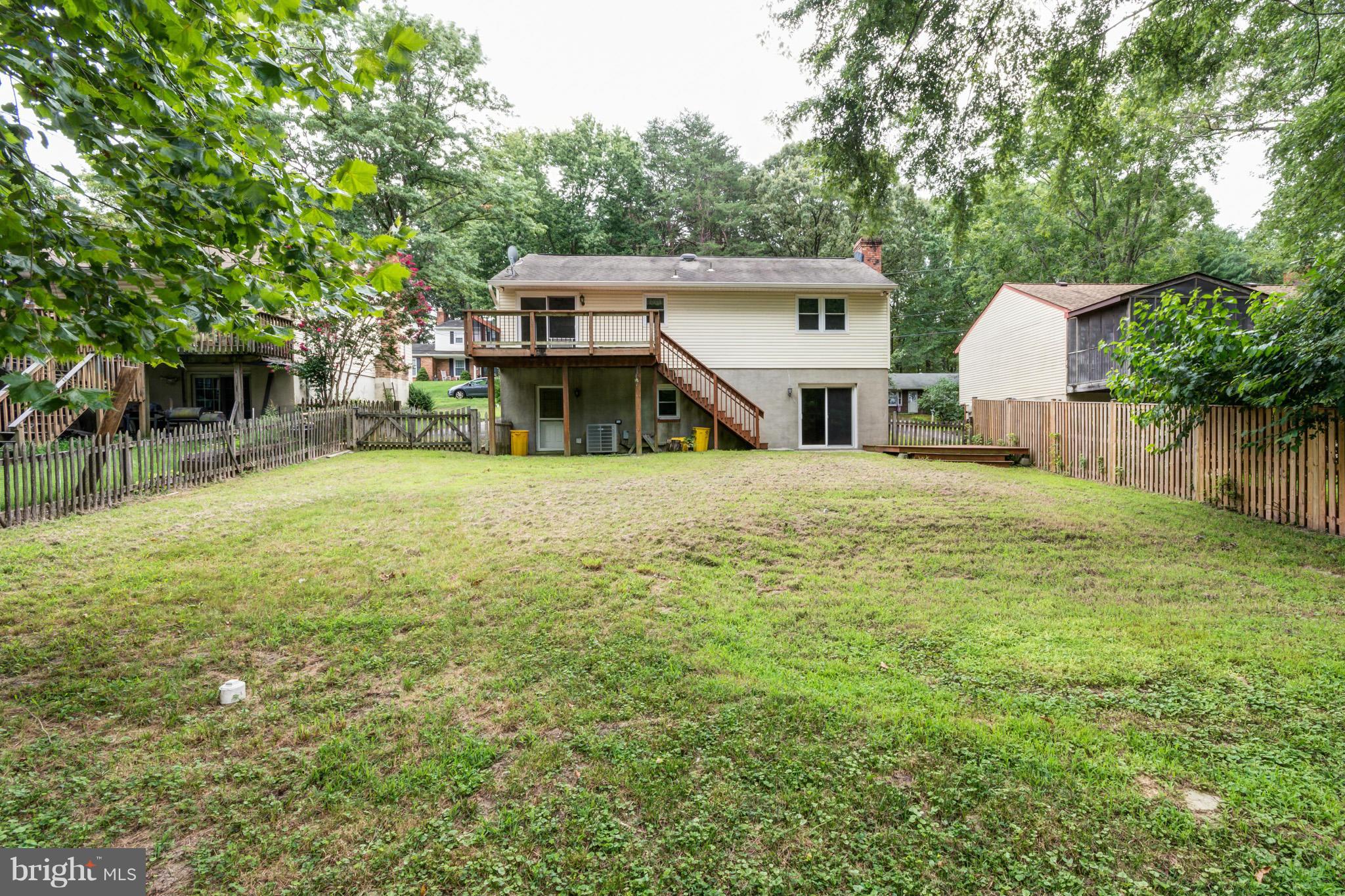 730 Rosewood Road Severn, MD 21144 - Photo 28 of 30 a view of a house with a yard and sitting area
