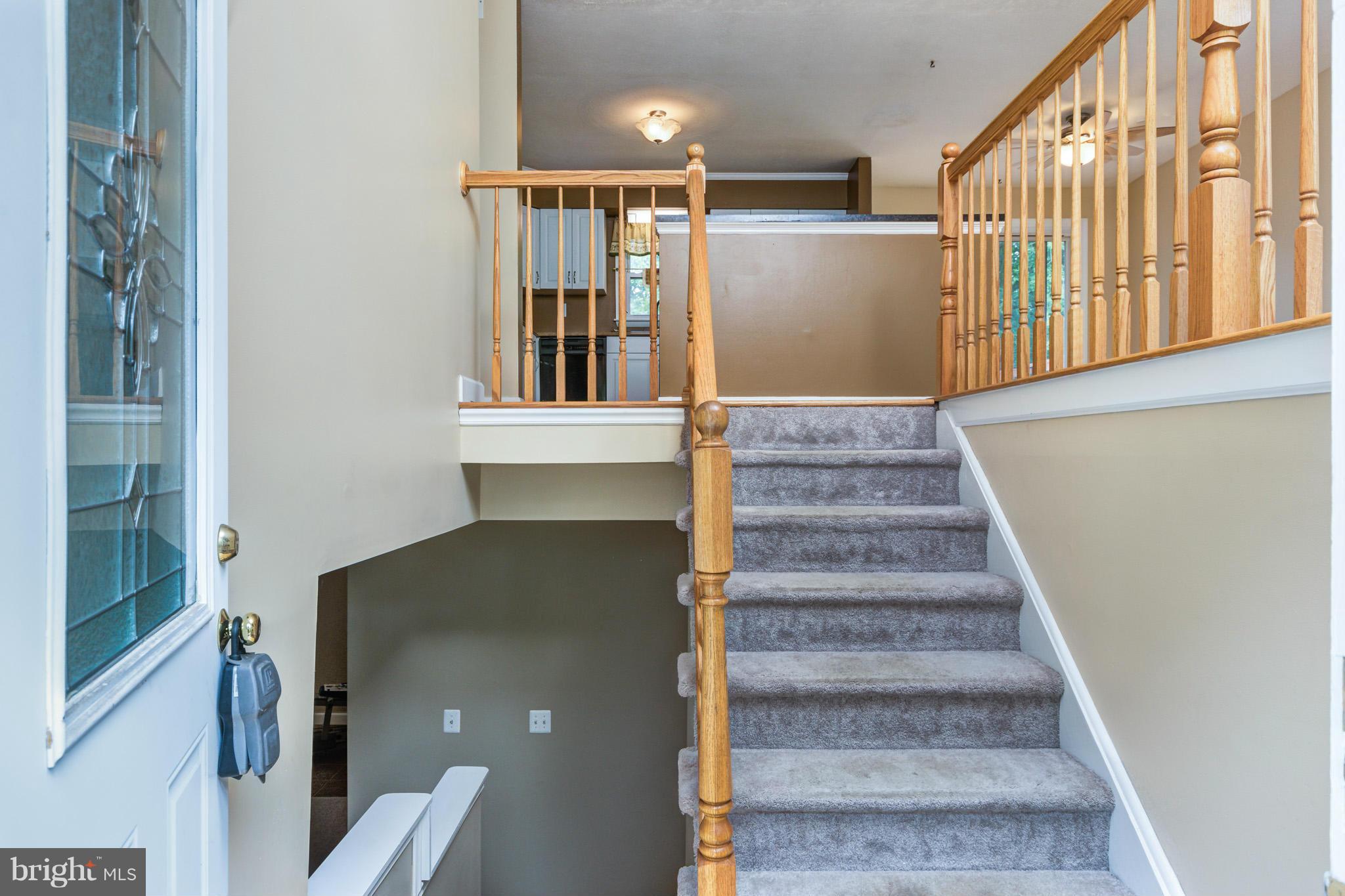 730 Rosewood Road Severn, MD 21144 - Photo 5 of 30 a view of entryway and hall with wooden floor
