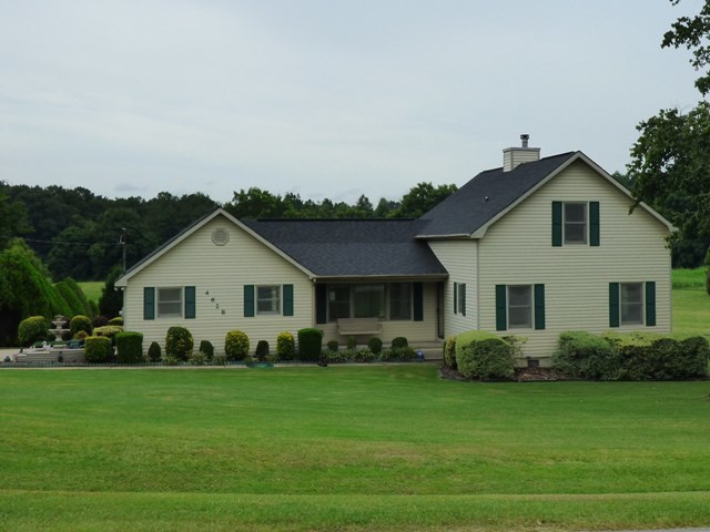 4628 Jones Road Macon, GA 31216 - Photo 1 of 25 a front view of house with a garden