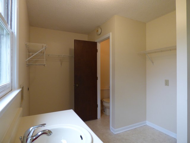 4628 Jones Road Macon, GA 31216 - Photo 12 of 25 a bathroom with a sink and a tub