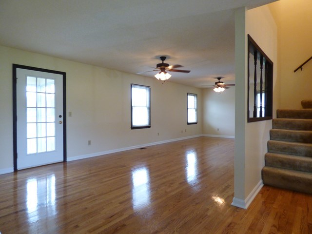4628 Jones Road Macon, GA 31216 - Photo 4 of 25 a view of an empty room with wooden floor and a window