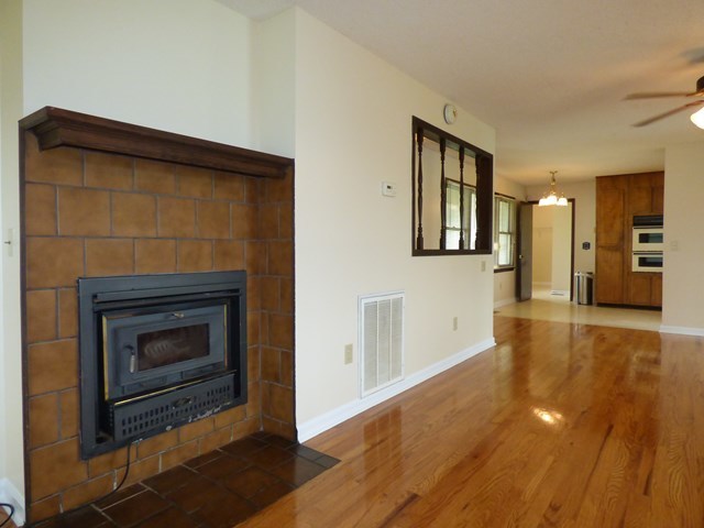 4628 Jones Road Macon, GA 31216 - Photo 6 of 25 a living room with a fireplace