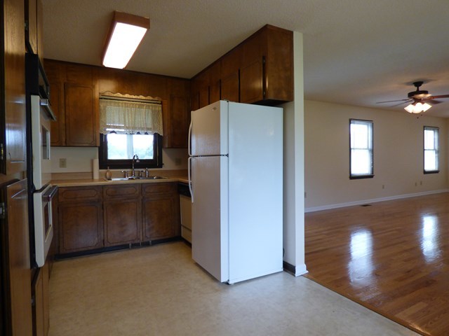 4628 Jones Road Macon, GA 31216 - Photo 10 of 25 a kitchen with windows and refrigerator