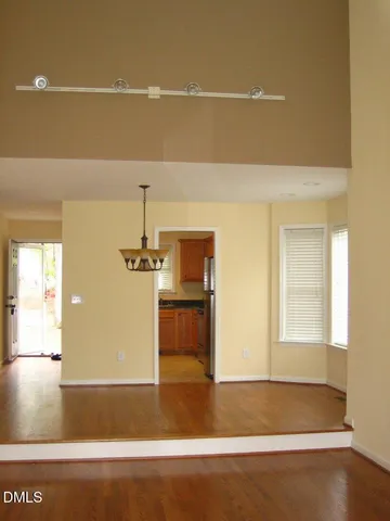 a view of a livingroom with wooden floor