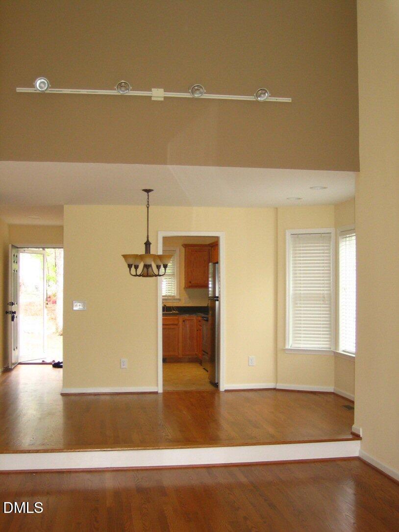 4708 Fargo Court Raleigh, NC 27612 - Photo 3 of 4 a view of a livingroom with wooden floor