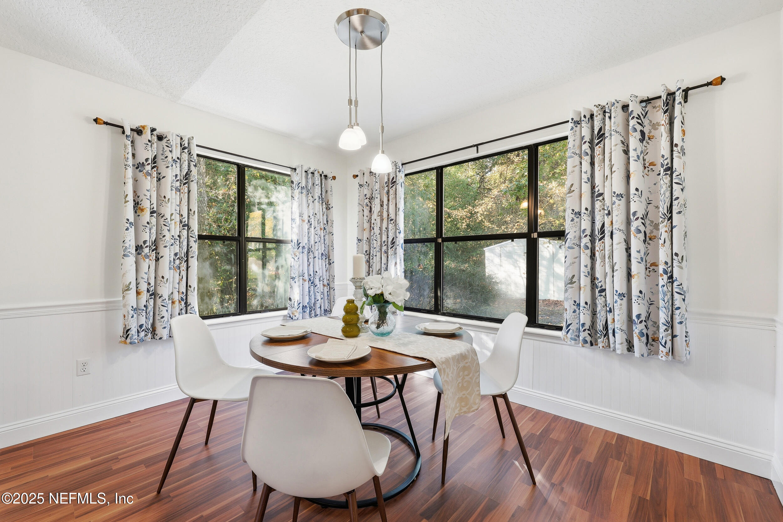 1626 Sandy Hollow Loop Middleburg, FL 32068 - Photo 13 of 40 a view of a dining room with furniture window and outside view