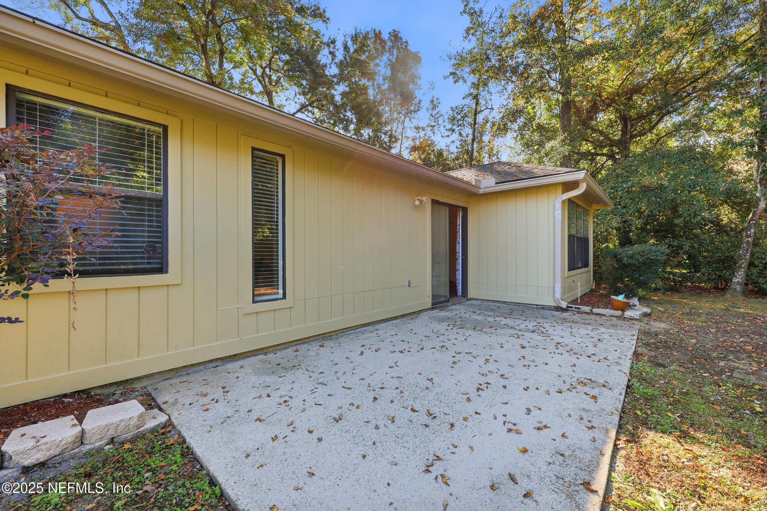 1626 Sandy Hollow Loop Middleburg, FL 32068 - Photo 33 of 40 a front view of a house with a yard