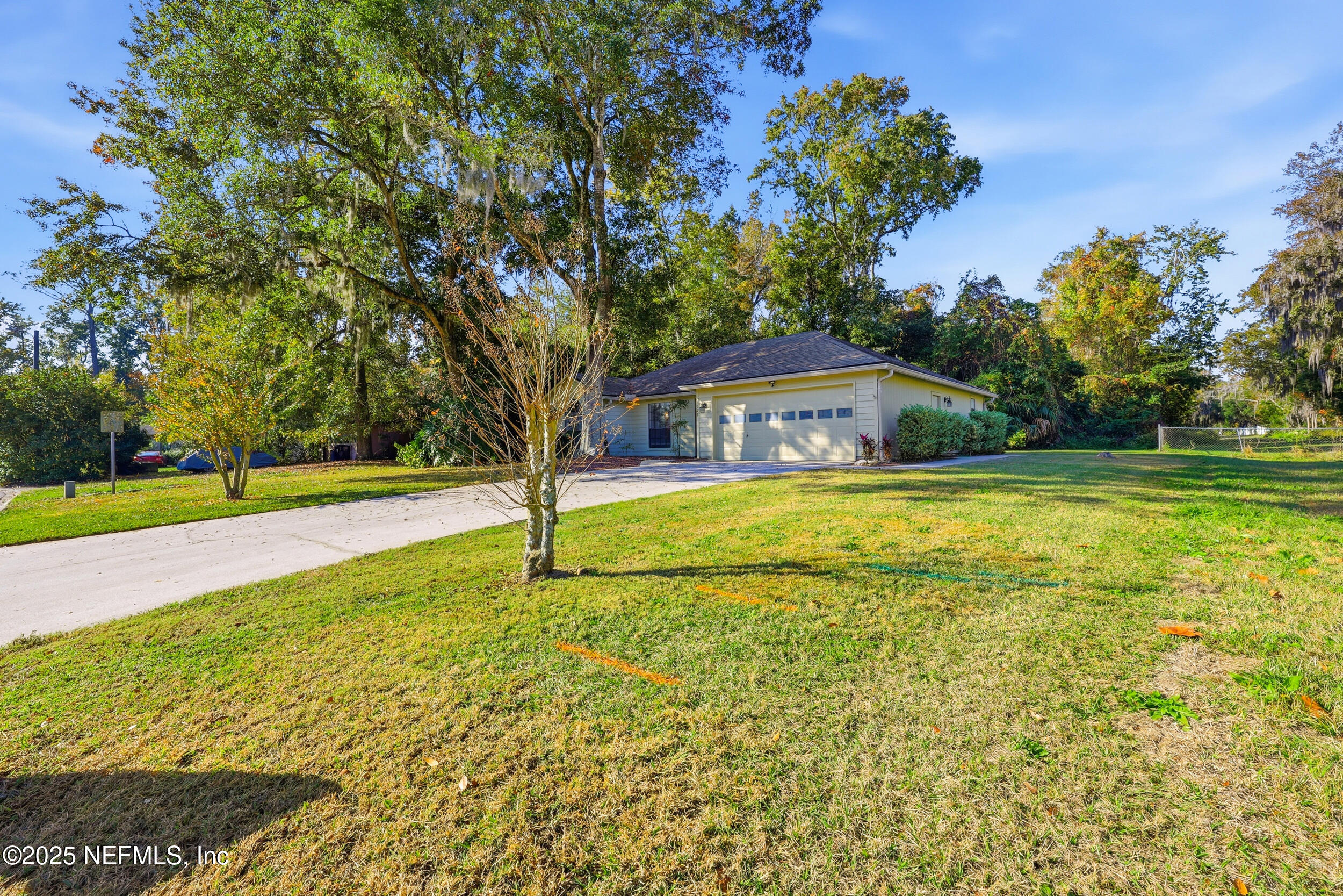 1626 Sandy Hollow Loop Middleburg, FL 32068 - Photo 38 of 40 a view of a swimming pool with an outdoor space and seating area