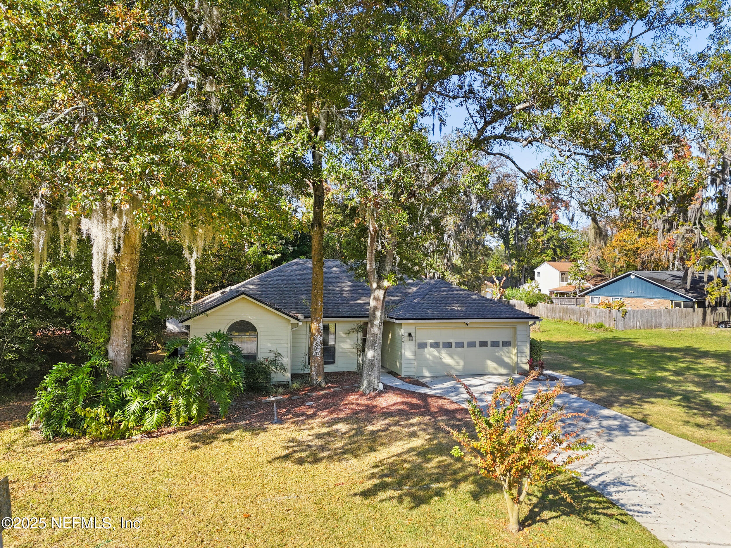 1626 Sandy Hollow Loop Middleburg, FL 32068 - Photo 39 of 40 a view of a house with a yard
