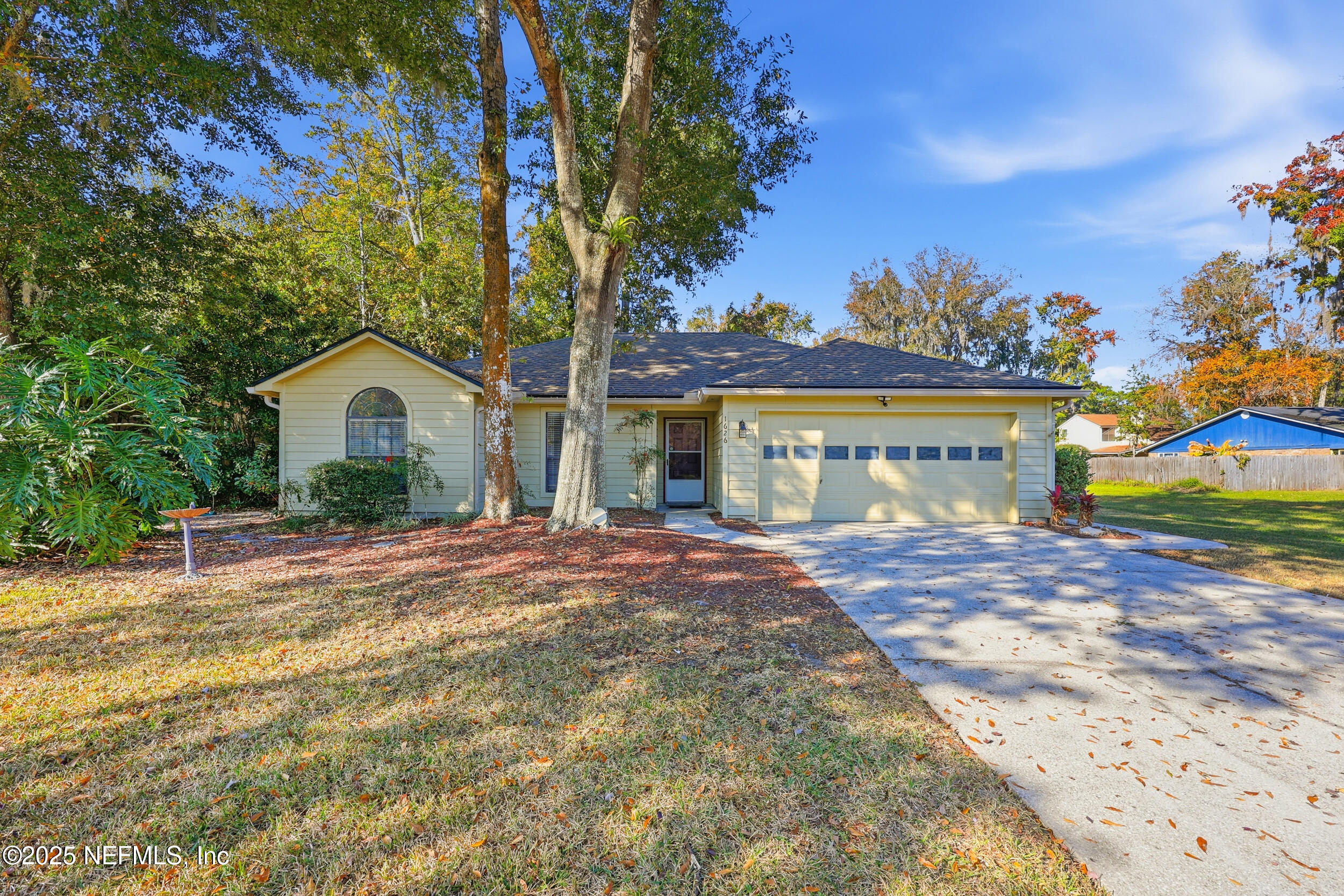 1626 Sandy Hollow Loop Middleburg, FL 32068 - Photo 40 of 40 a view of a house with a yard and tree