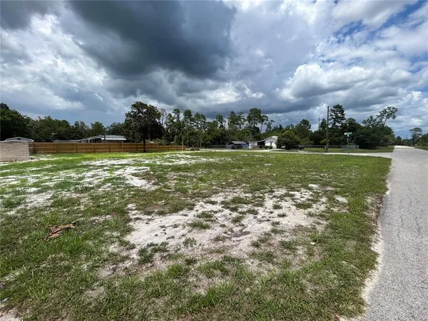 a view of outdoor space and yard
