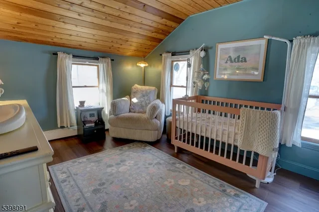 a bed room with furniture and a window