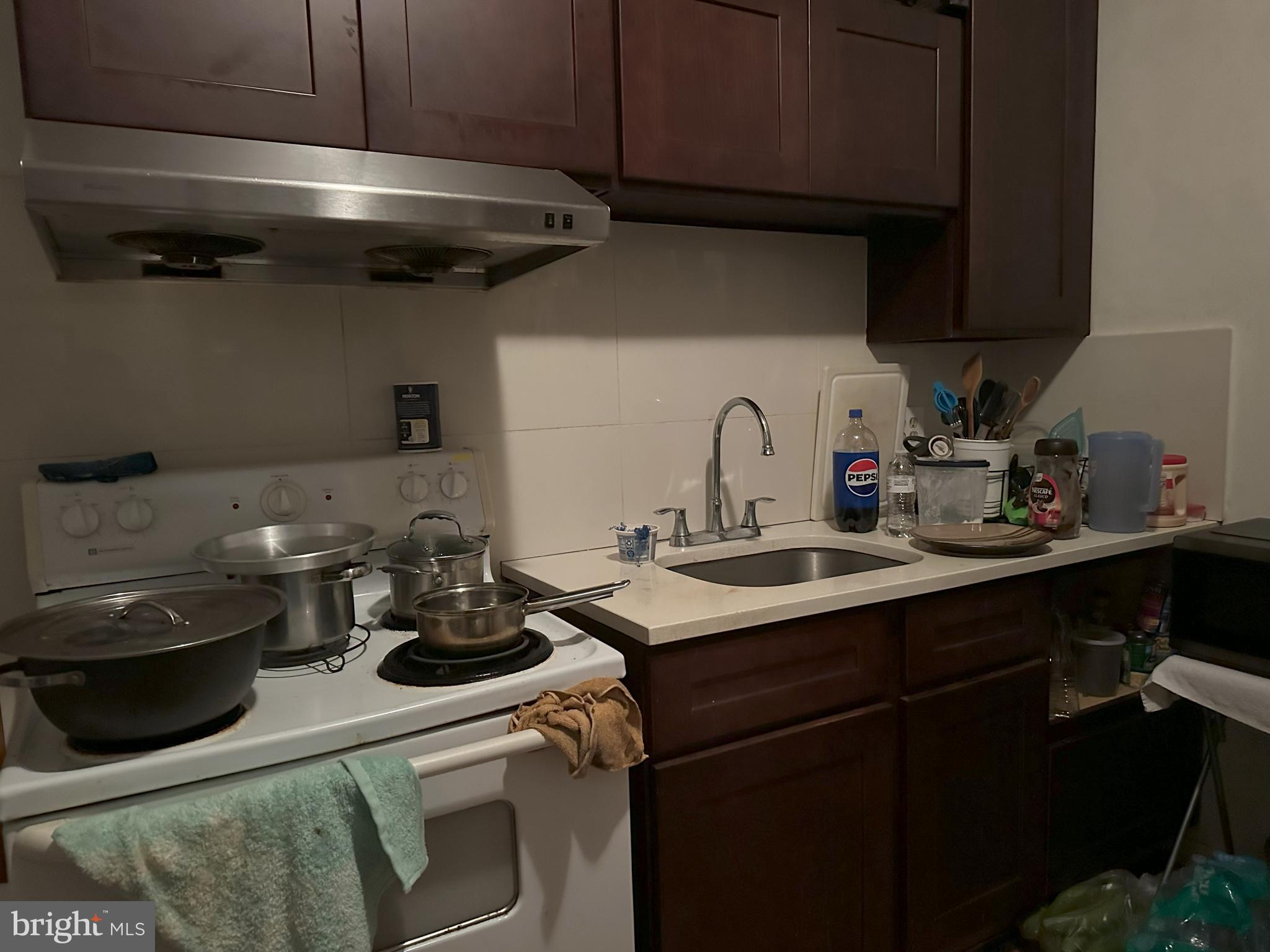 2014 South 7th Street Philadelphia, PA 19148 - Photo 14 of 23 a kitchen with a sink and cabinets