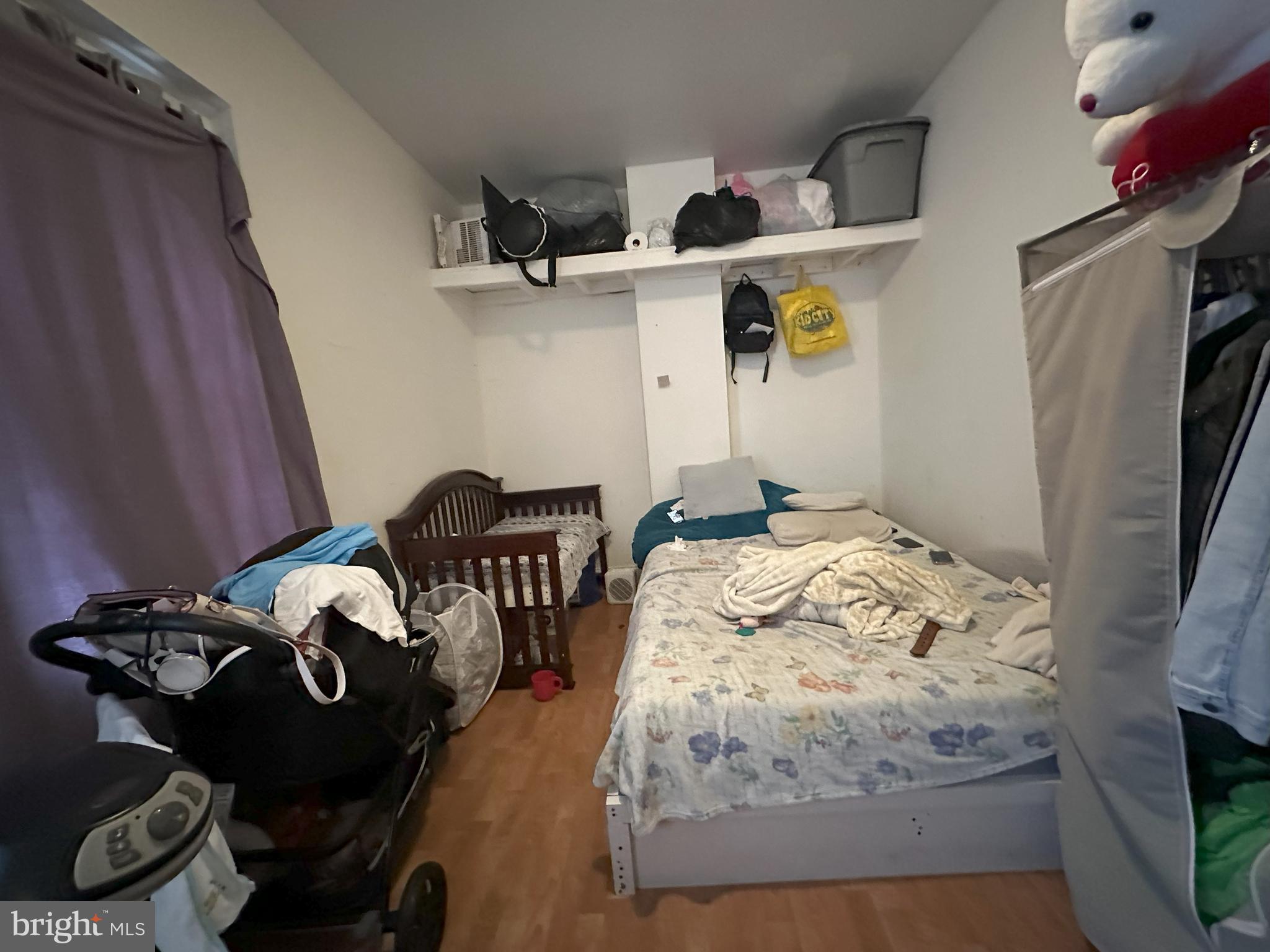 2014 South 7th Street Philadelphia, PA 19148 - Photo 17 of 23 a bedroom with bed and a window