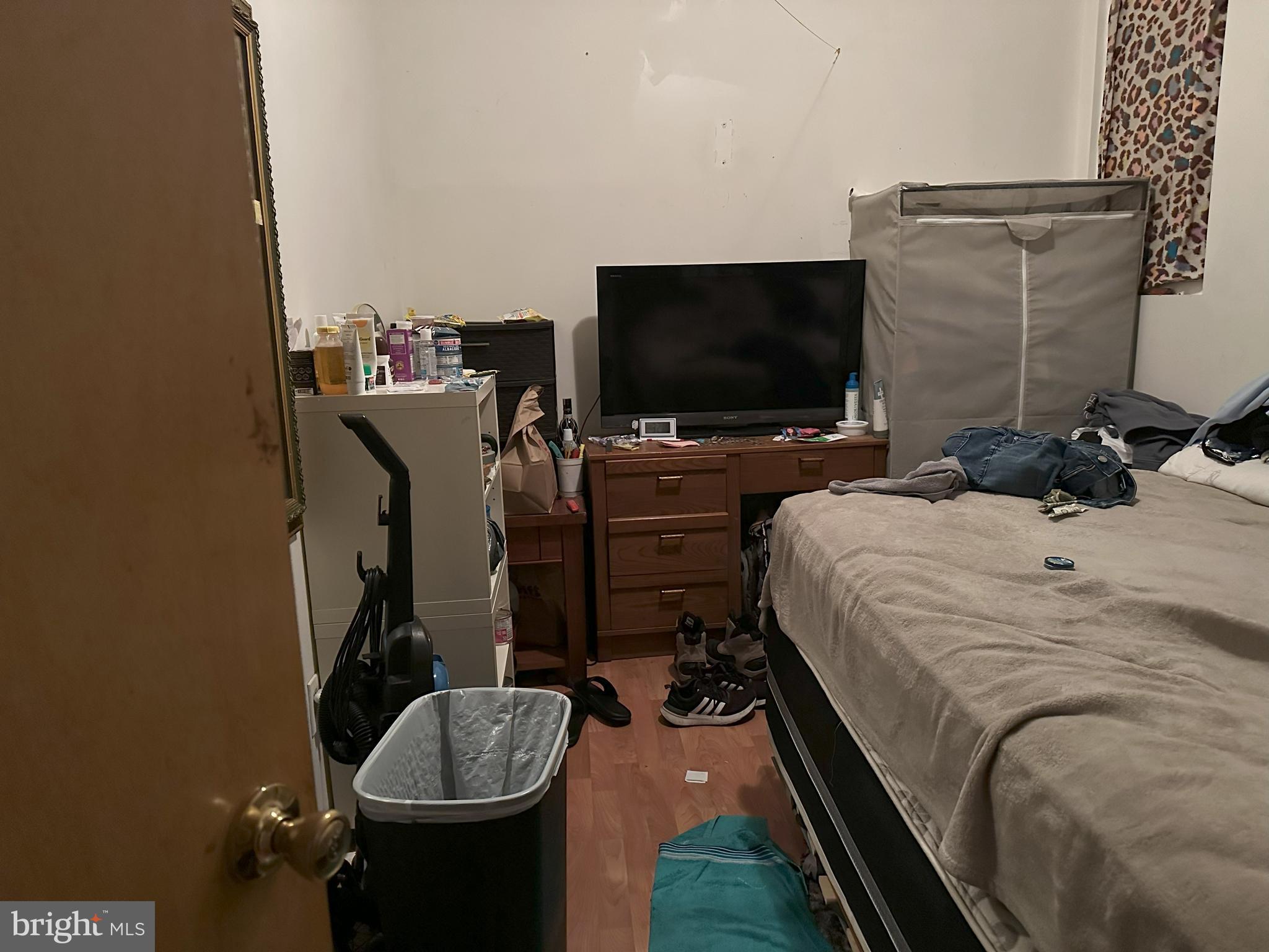 2014 South 7th Street Philadelphia, PA 19148 - Photo 18 of 23 a bedroom with a bed and a flat screen tv