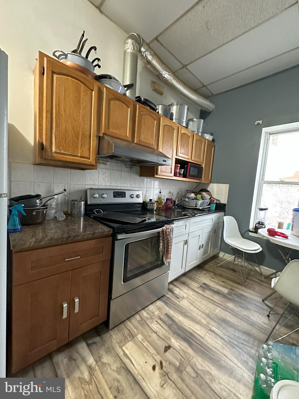 2014 South 7th Street Philadelphia, PA 19148 - Photo 23 of 23 a kitchen with stainless steel appliances granite countertop a stove a sink and a granite counter tops