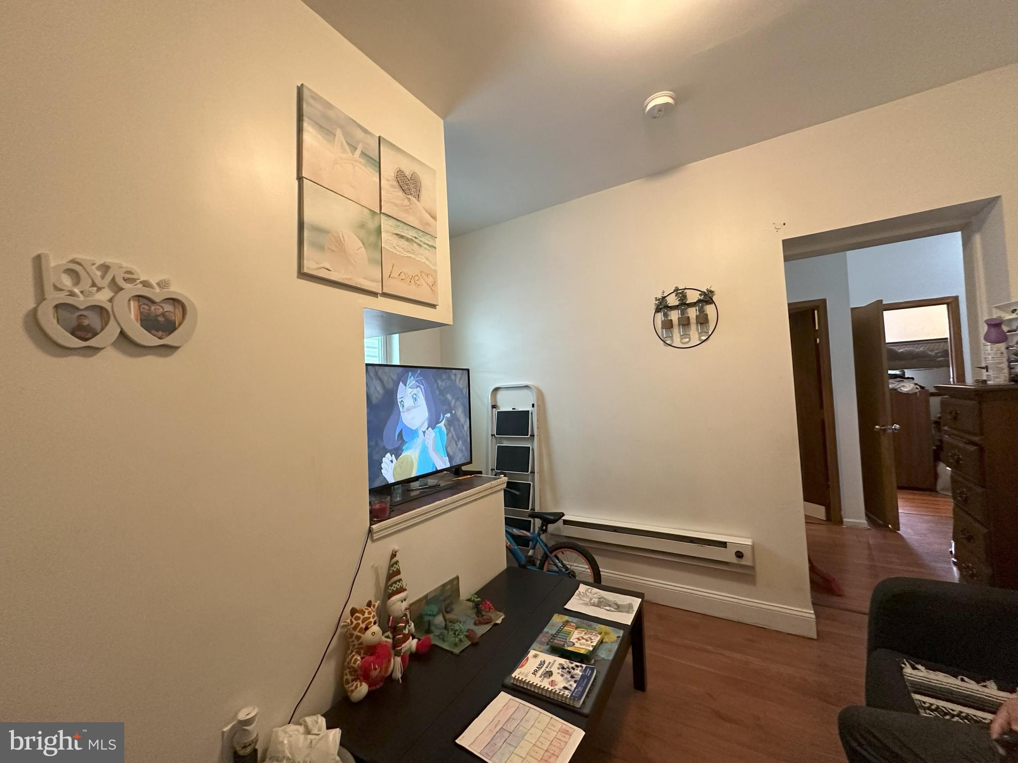 2014 South 7th Street Philadelphia, PA 19148 - Photo 6 of 23 a living room with furniture and a flat screen tv