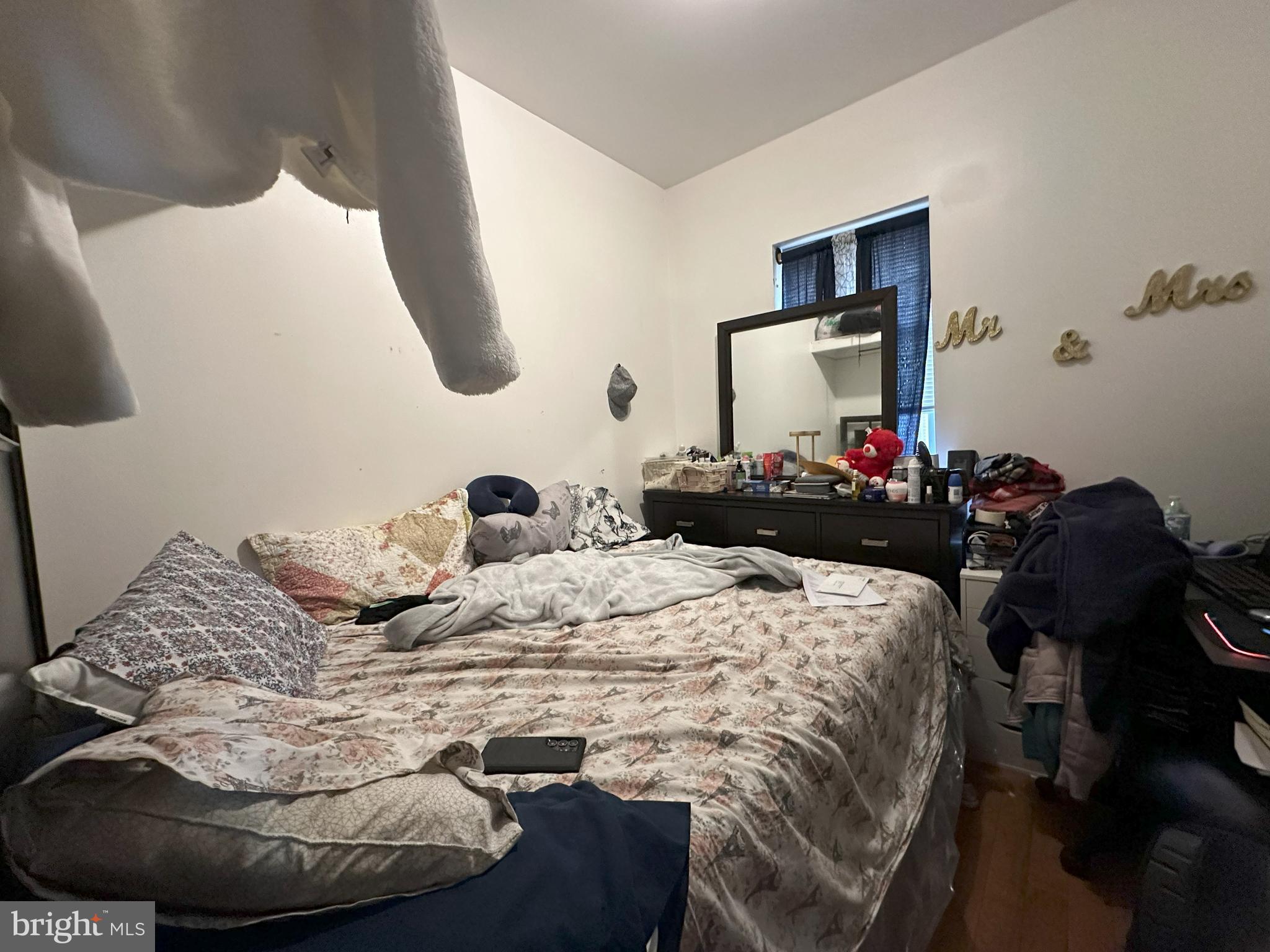 2014 South 7th Street Philadelphia, PA 19148 - Photo 10 of 23 a bedroom with a bed and a mirror