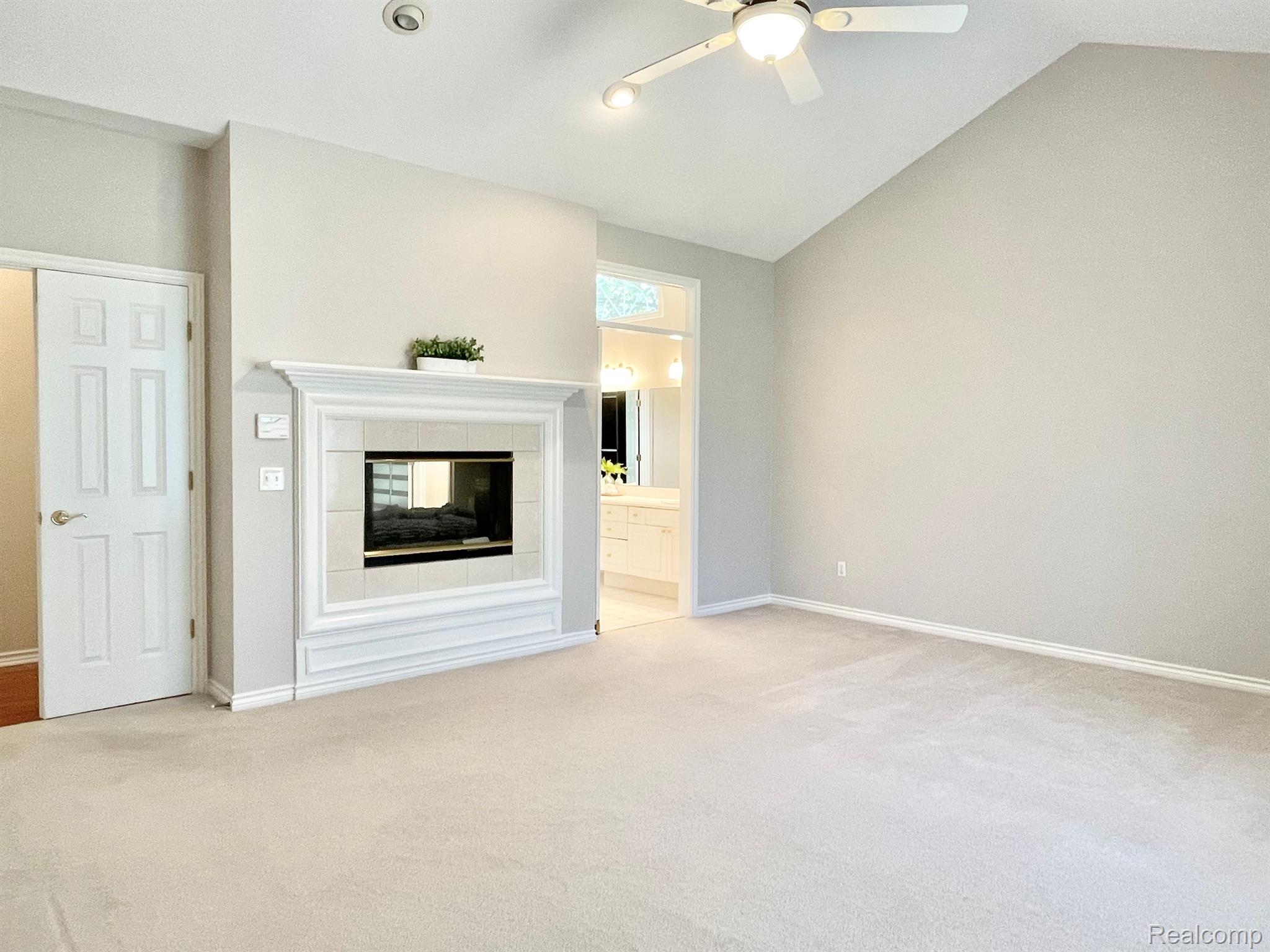 5706 Kirkridge Trail Rochester, MI 48306 - Photo 24 of 60 2-sided gas fireplace in primary suite