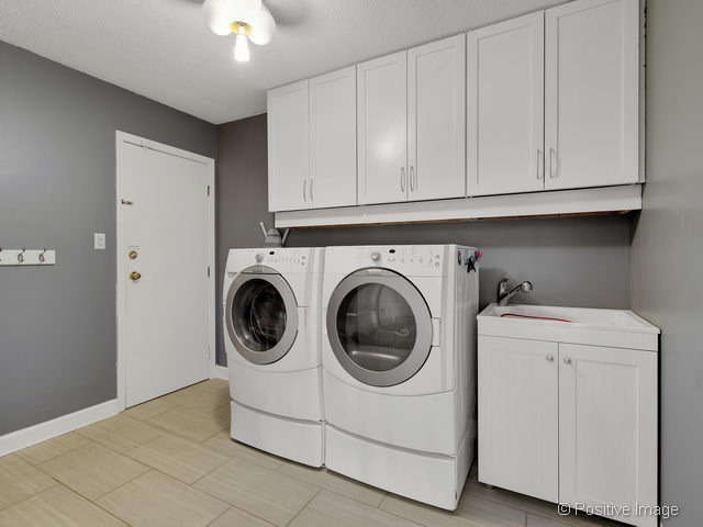 2S184 Sheffield Road Glen Ellyn, IL 60137 - Photo 14 of 25 a utility room with dryer and washer