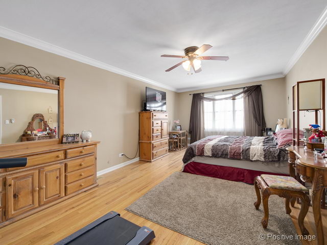 2S184 Sheffield Road Glen Ellyn, IL 60137 - Photo 16 of 25 a living room with furniture and a wooden floor