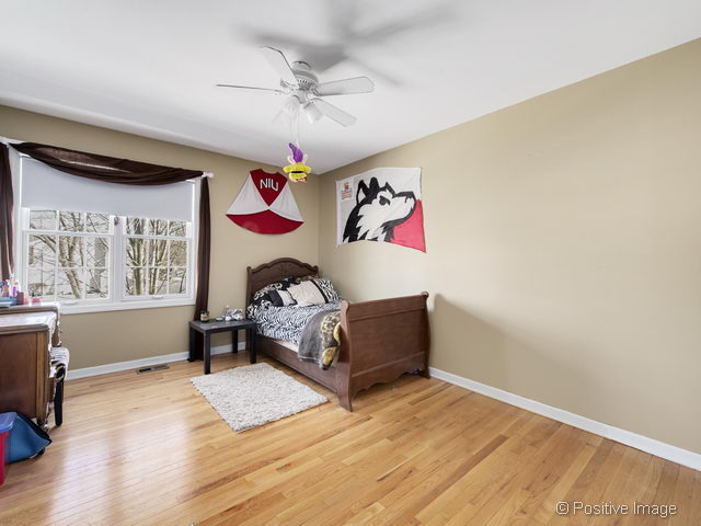 2S184 Sheffield Road Glen Ellyn, IL 60137 - Photo 19 of 25 a living room with furniture and window