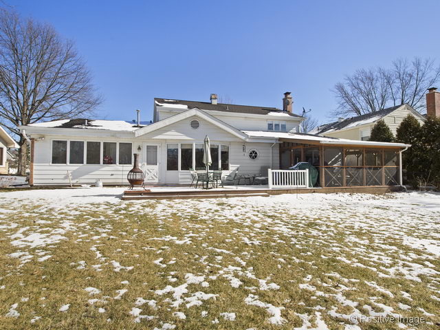2S184 Sheffield Road Glen Ellyn, IL 60137 - Photo 25 of 25 a front view of a house with a yard