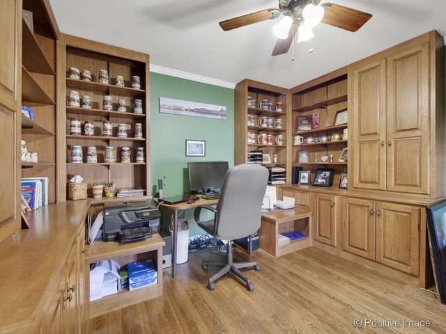2S184 Sheffield Road Glen Ellyn, IL 60137 - Photo 5 of 25 a view of a workspace with furniture and toys