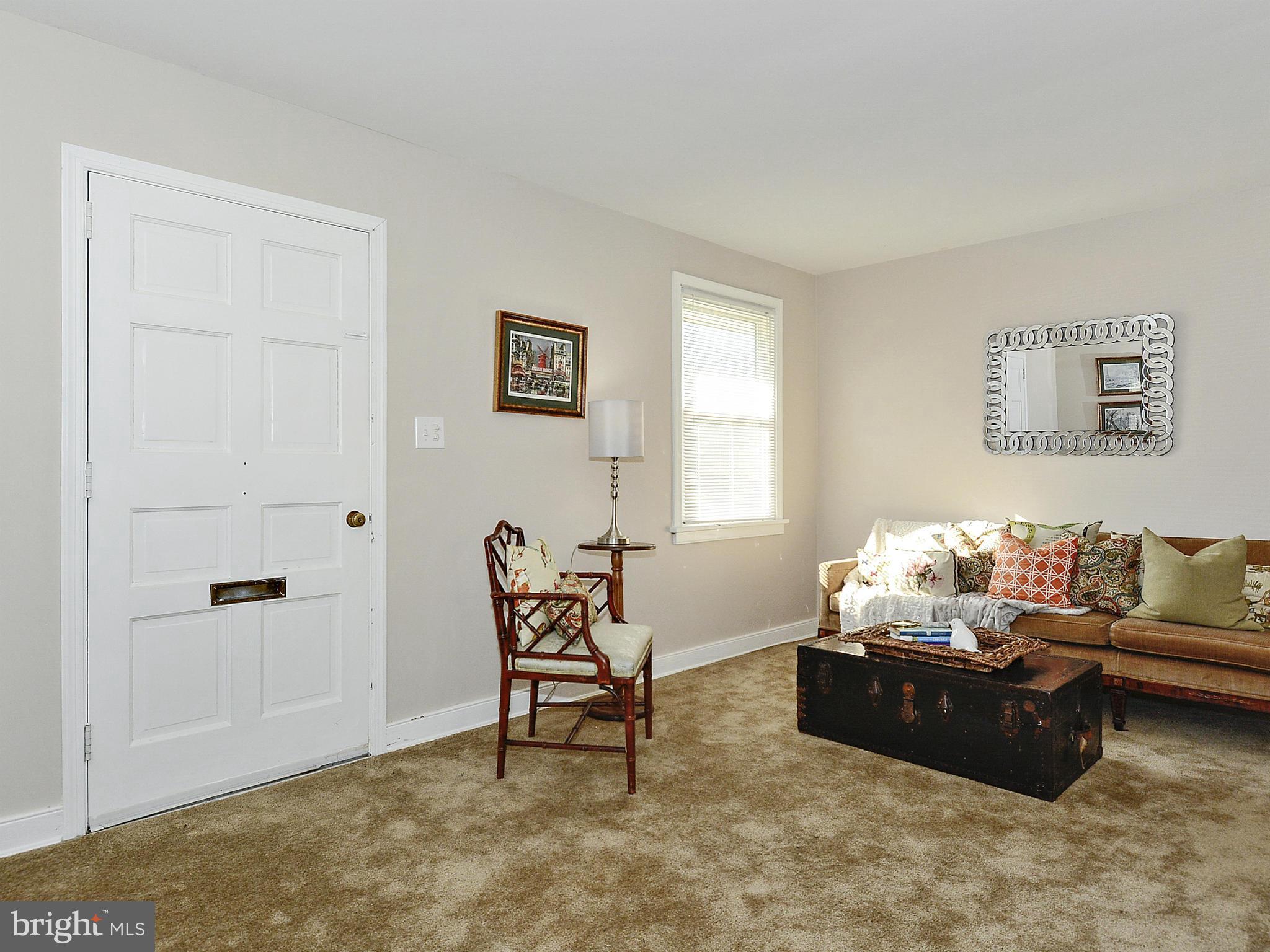 2721 Randolph Road Silver Spring, MD 20902 - Photo 2 of 25 a living room with furniture and a window