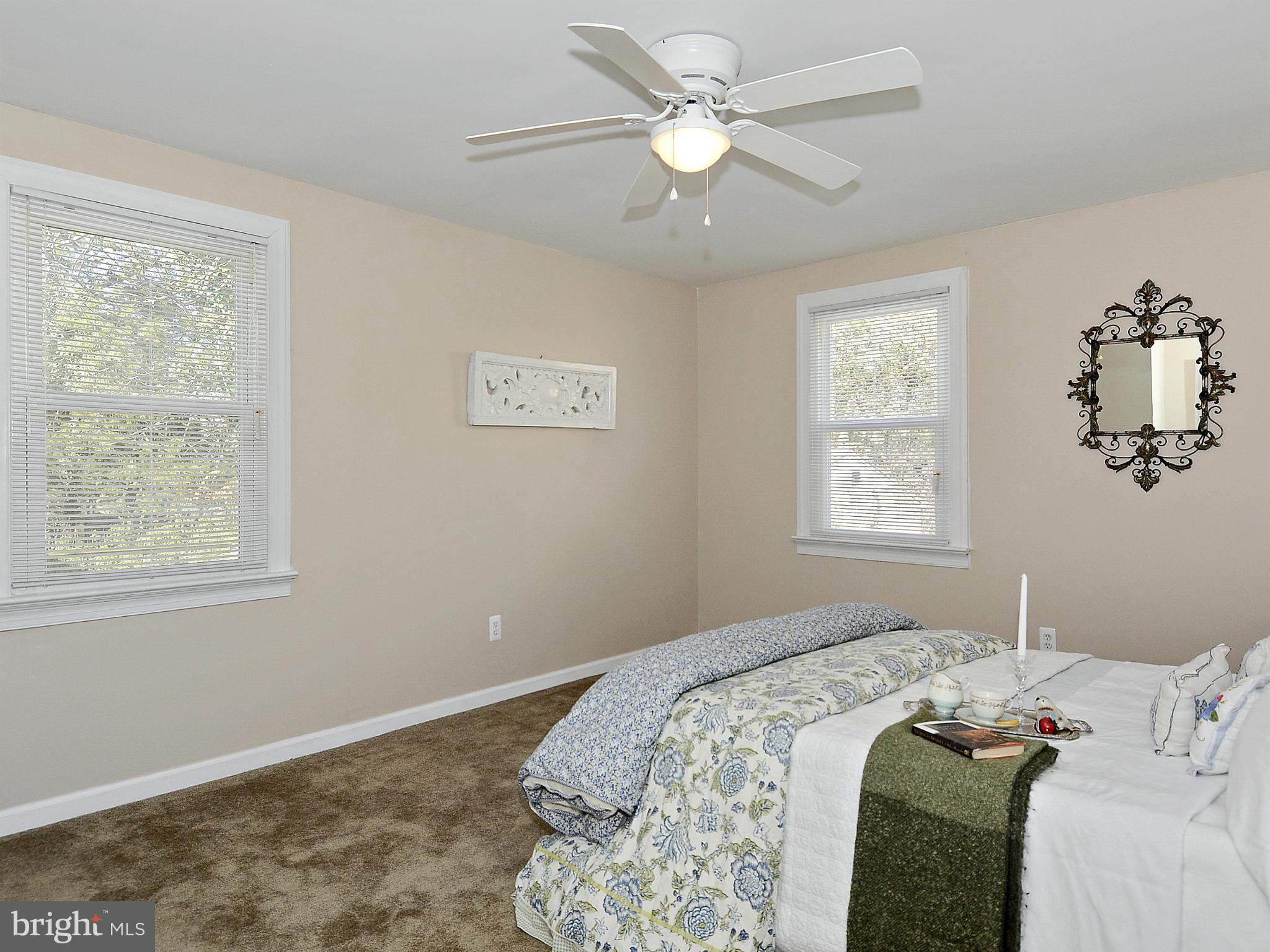 2721 Randolph Road Silver Spring, MD 20902 - Photo 11 of 25 a bedroom with a bed and a window