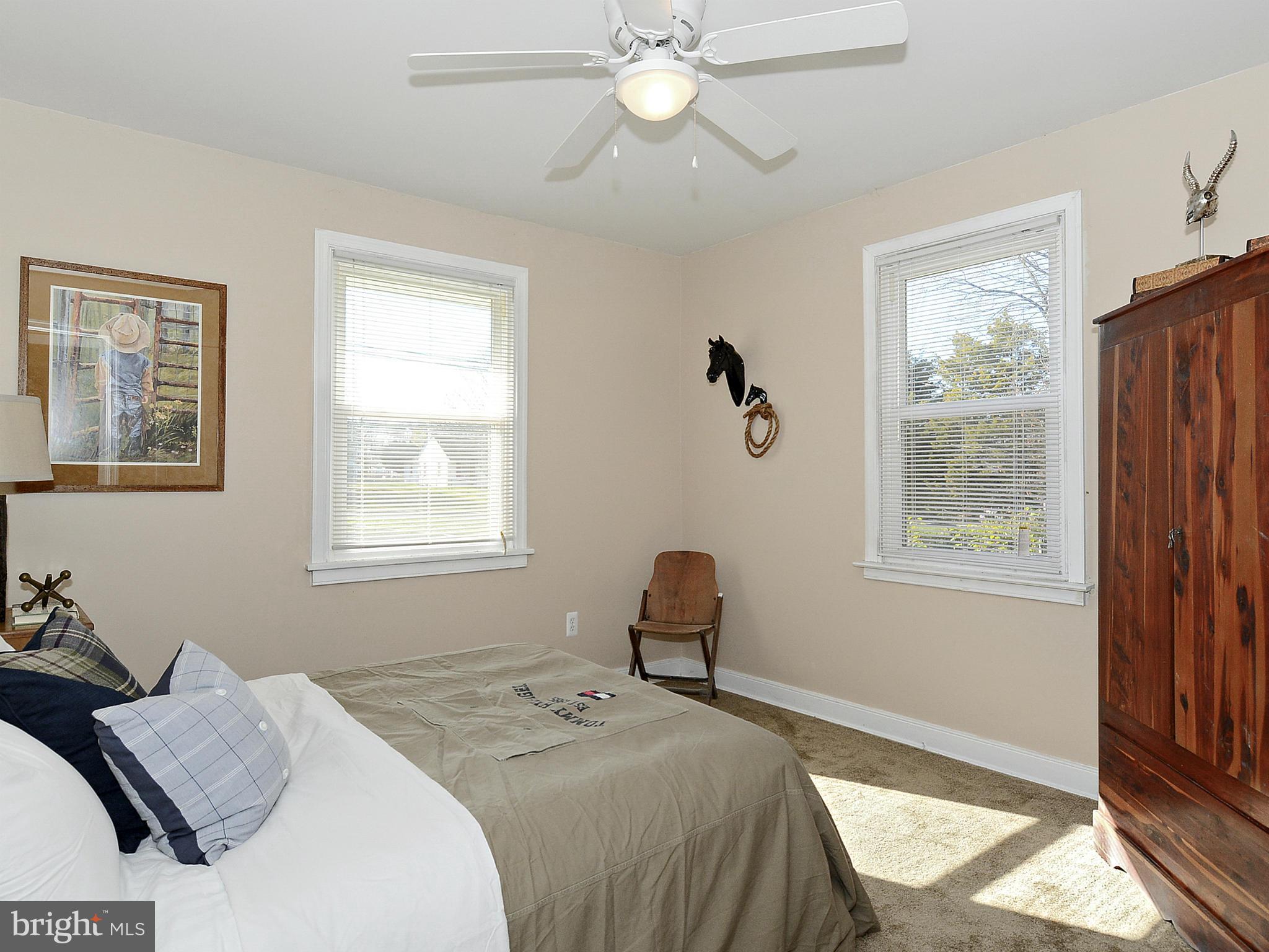2721 Randolph Road Silver Spring, MD 20902 - Photo 15 of 25 a bedroom with a bed and a window