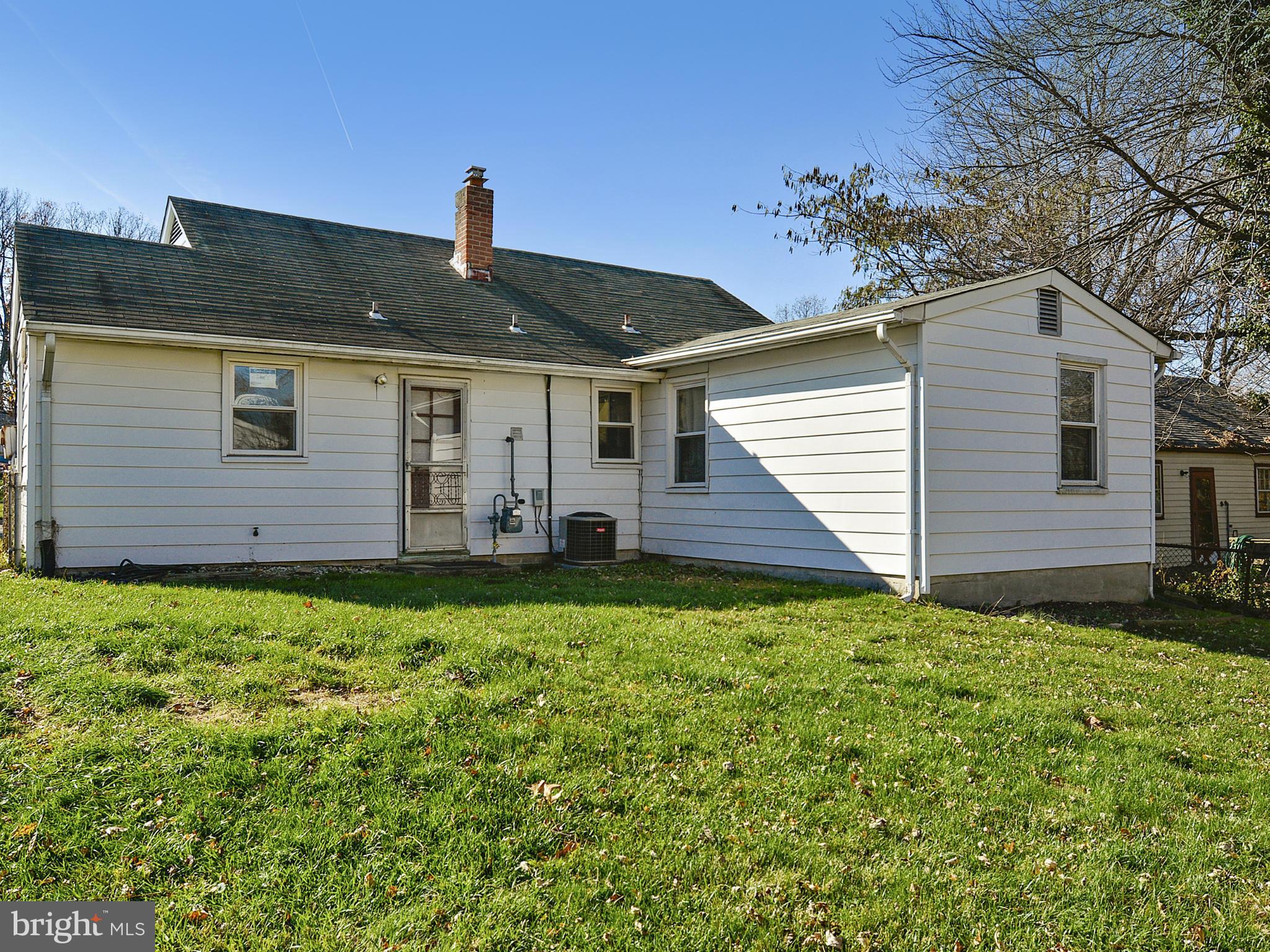 2721 Randolph Road Silver Spring, MD 20902 - Photo 17 of 25 a front view of a house with garden
