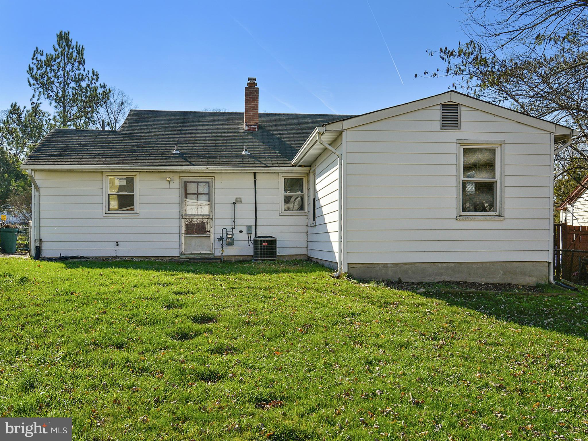 2721 Randolph Road Silver Spring, MD 20902 - Photo 18 of 25 a front view of a house with a yard