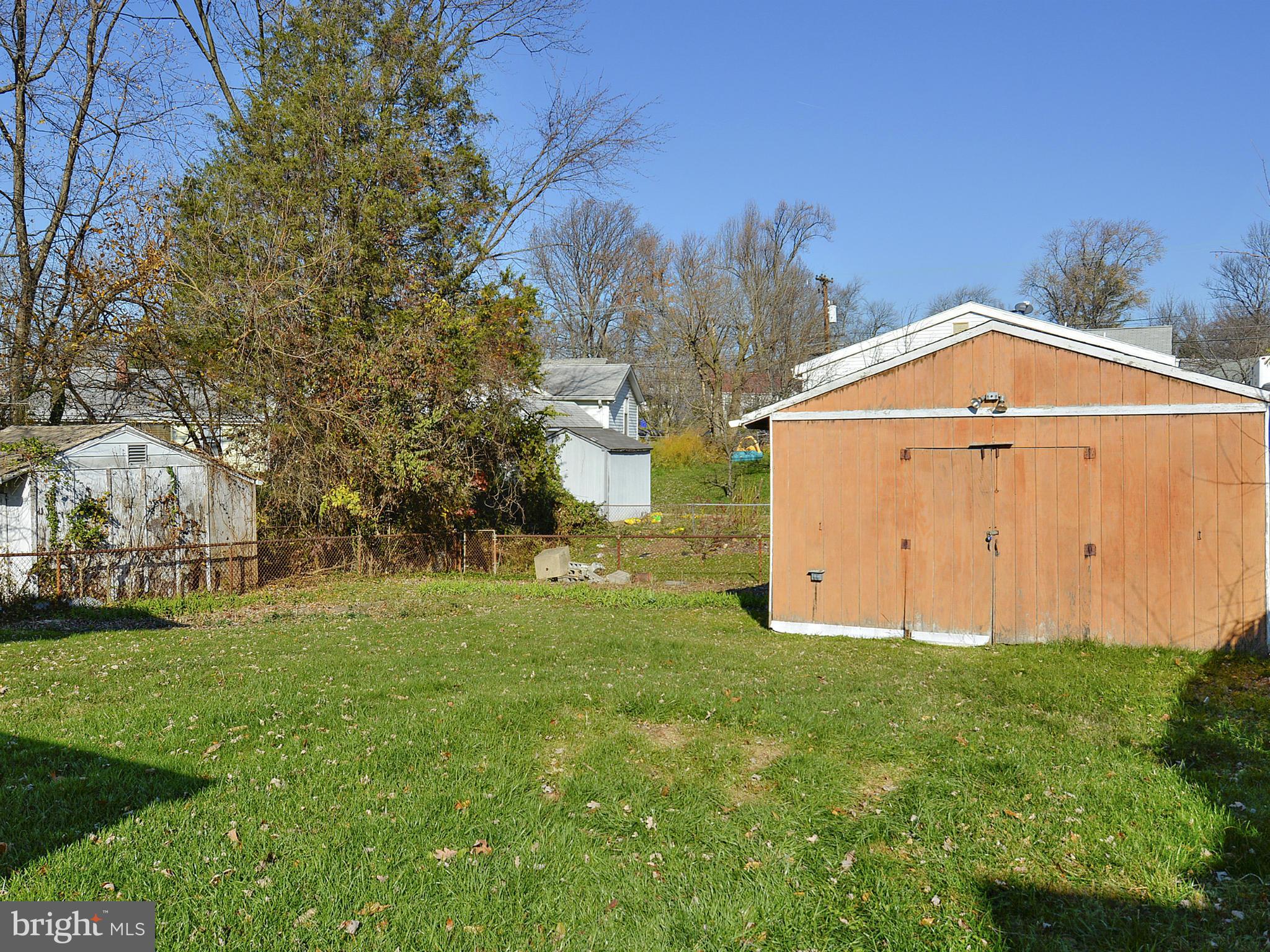 2721 Randolph Road Silver Spring, MD 20902 - Photo 19 of 25 a view of a tiny house with a yard