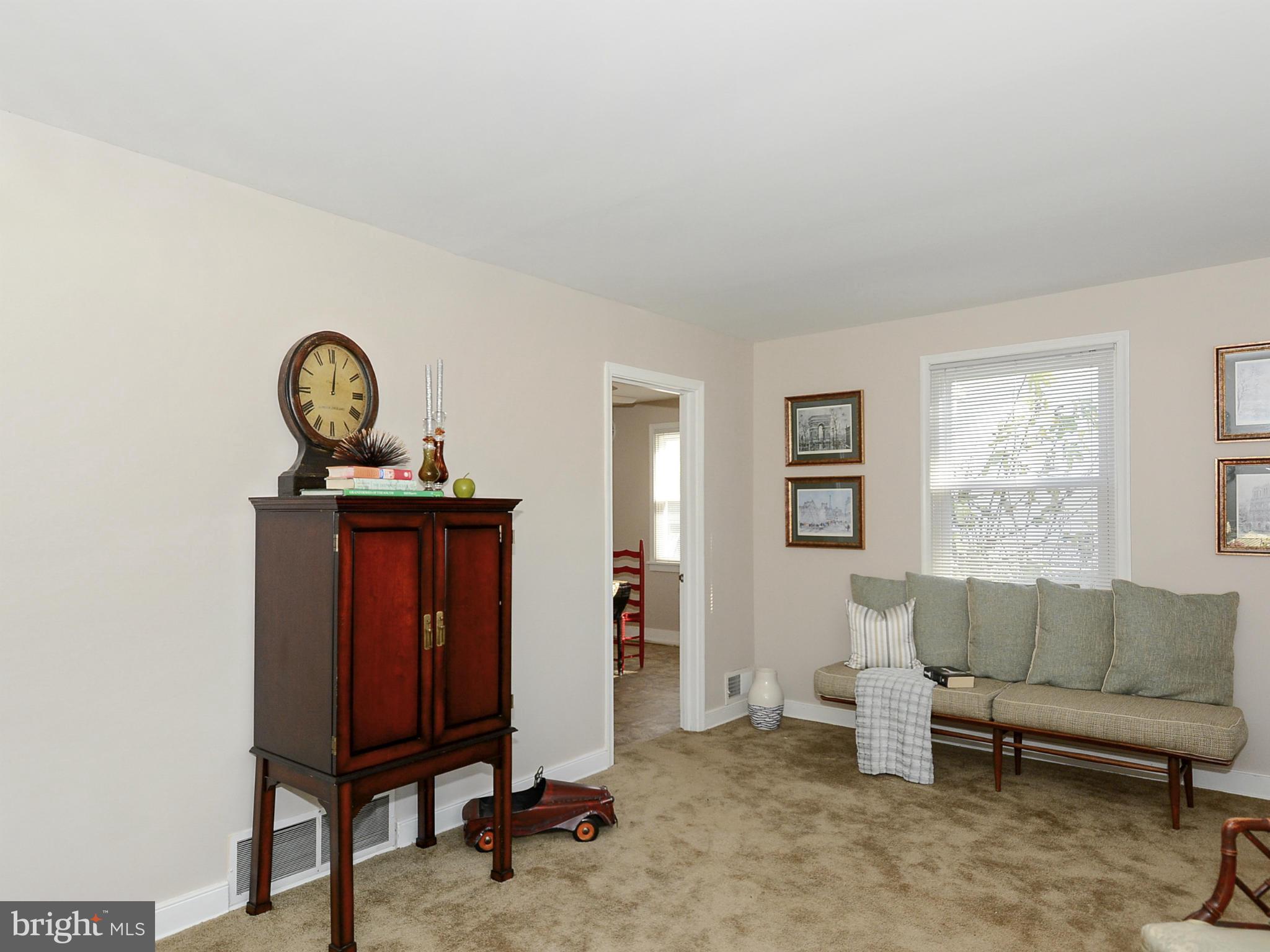 2721 Randolph Road Silver Spring, MD 20902 - Photo 4 of 25 a living room with furniture and a window