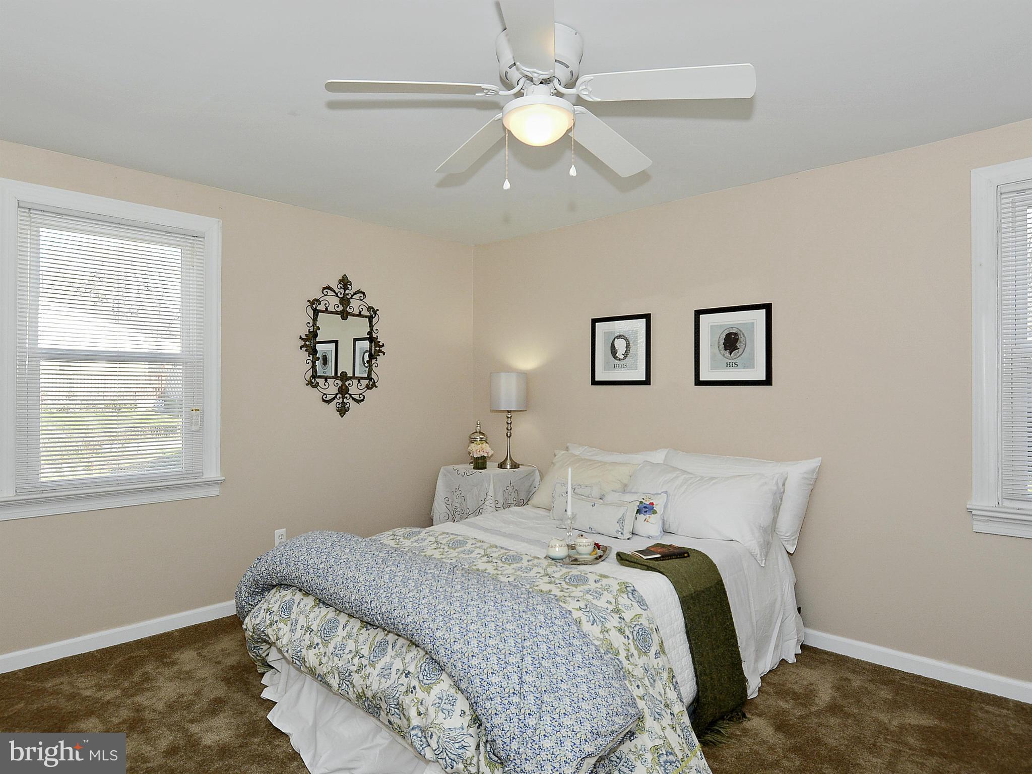 2721 Randolph Road Silver Spring, MD 20902 - Photo 9 of 25 a bedroom with a large bed and a window