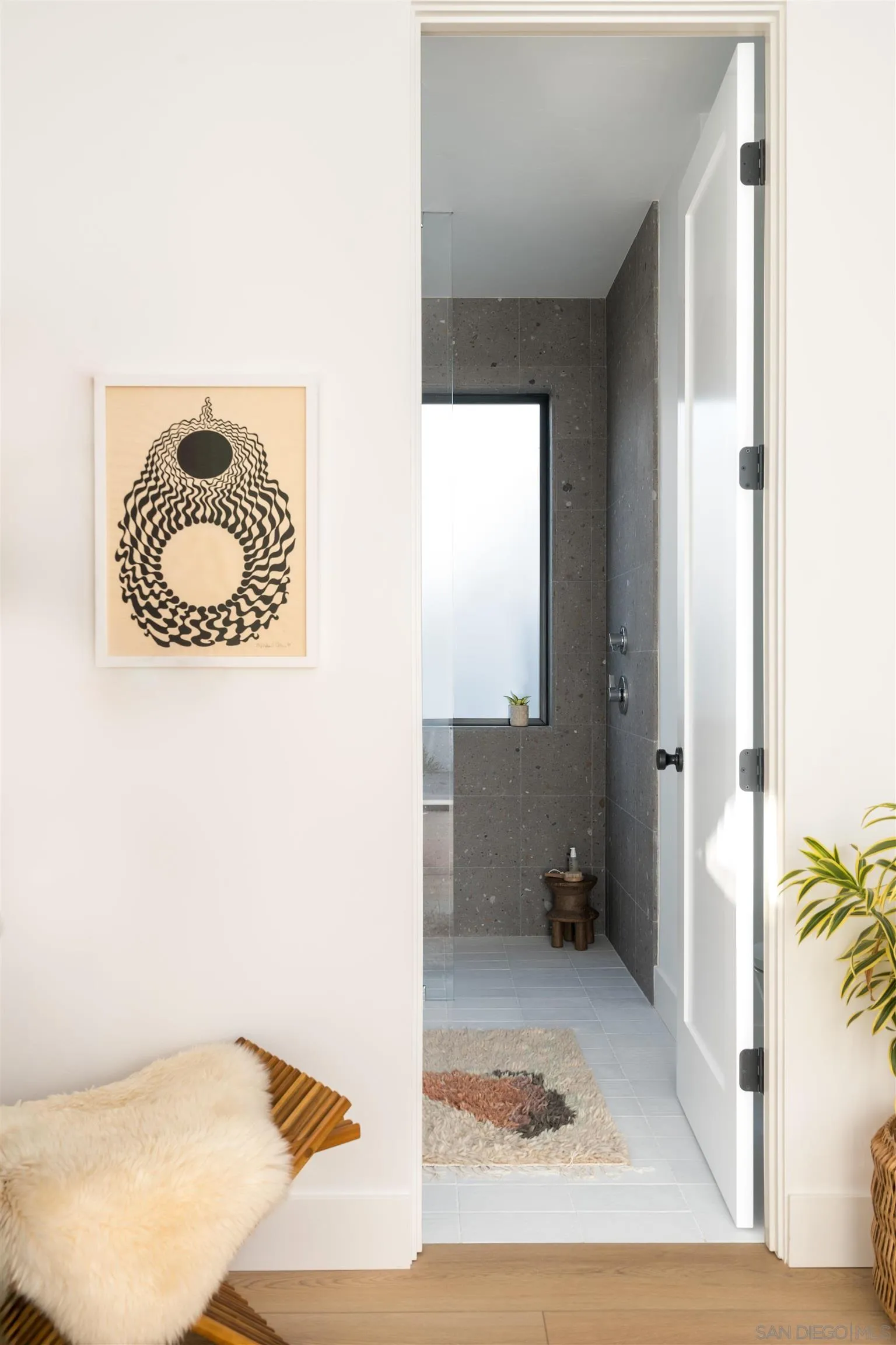 655 Lucylle Lane Encinitas, CA 92024 - Photo 15 of 23 a view of a room that has a couch in it