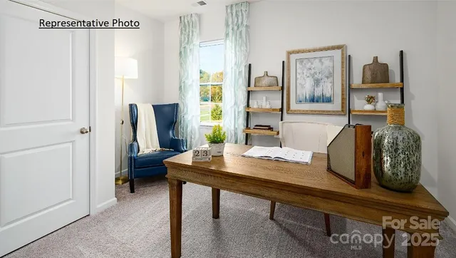 a bed room with a bed and a window